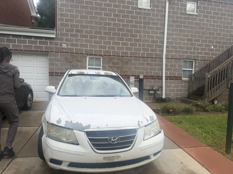 White Hyundai Sonata with the clearcoat peeling off the hood and roof, bought for cash for junk cars in Chicago